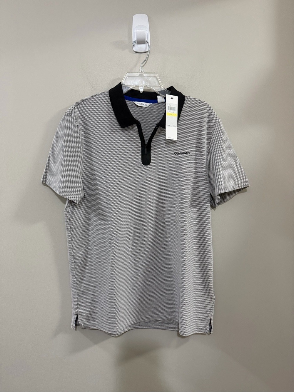 NWT Calvin Klein Men's Light Gray Zip Polo with Black Collar. Size M